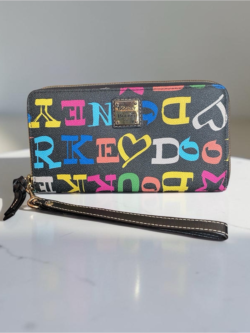 Dooney & Bourke Black/Multicolor “Doodle” Letter Print Logo Wristlet (Like New)